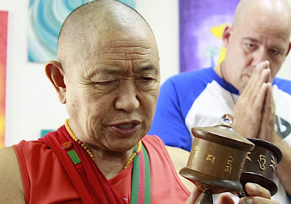 His Eminence Garchen Rinpoche visiting Holy Land Prayer Wheels in Israel. Behind Rinpoche is Micha Strauss.