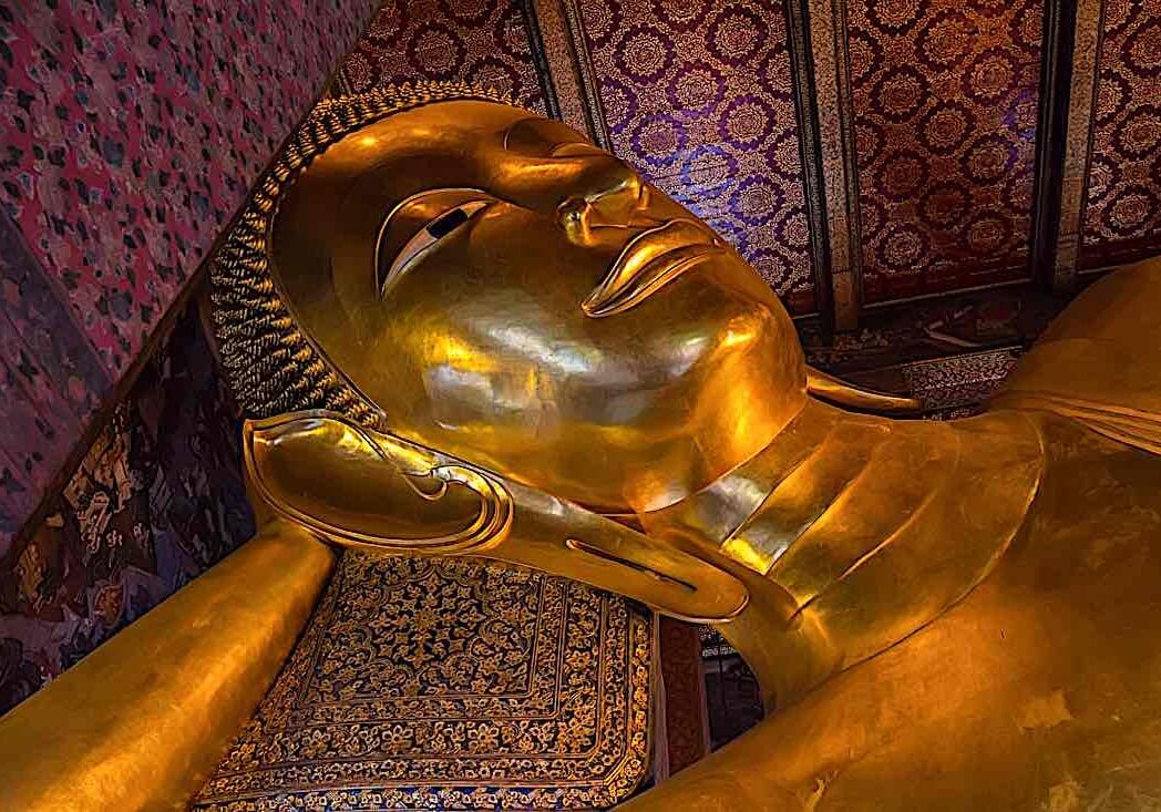 The famous Sleeping Buddha statues portray the paranirvana of Shakyamuni Buddha, the Blessed One.